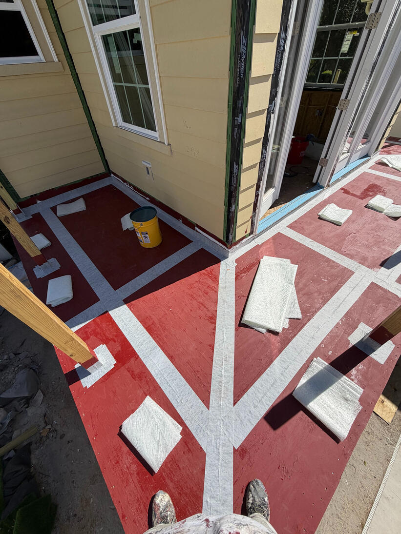 A critical substrate preparation layer featuring a high-bond epoxy primer. We treat all seams with polymeric rubberized tape and elastomeric sealant to effectively bridge transitions and prevent future cracking. A critical substrate preparation layer featuring a high-bond epoxy primer. We treat all seams with polymeric rubberized tape and elastomeric sealant to effectively bridge transitions and prevent future cracking.